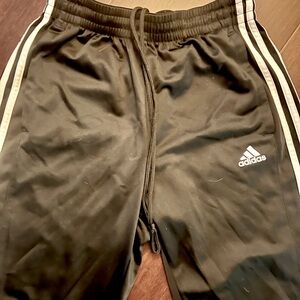Adidas Kids Black Joggers with White Stripes. Zip back pocket. Smoke free home